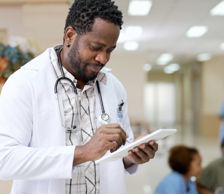 doctor with tablet