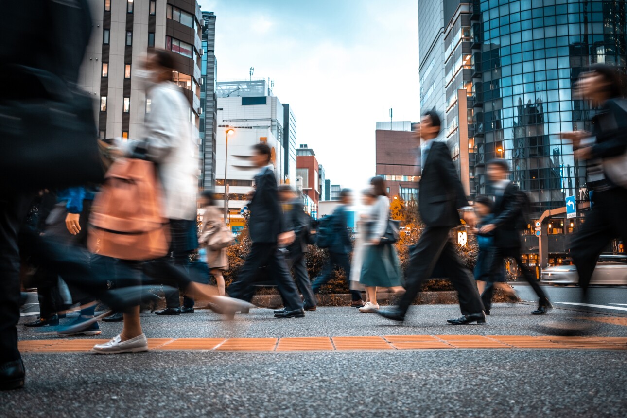 rred business people on their way from work