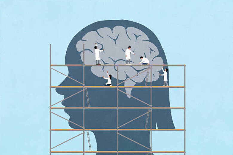 Scientists on scaffolding repairing brain in silhouetted girl's head