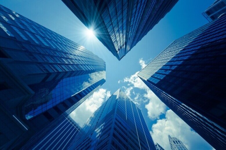 looking upward at sky scrapers