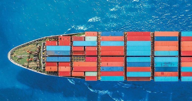 birds eye view of a container ship on the ocean