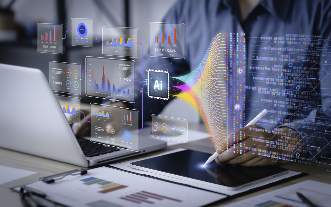 Analyst or Scientist uses a computer and dashboard for analysis of information on complex data sets on computer.