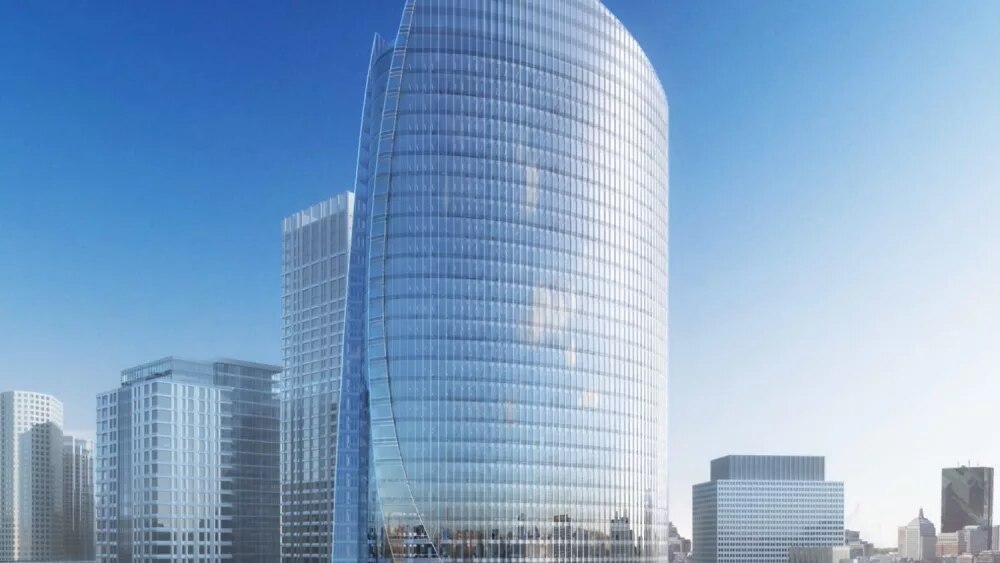 curved glass skyscraper in a city skyline