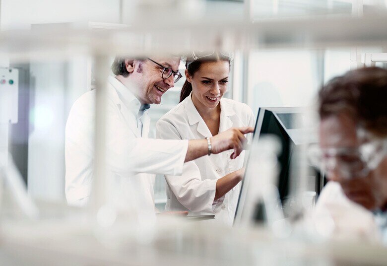 people collaborating in a lab