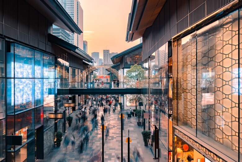 Busy outdoor shopping center in city