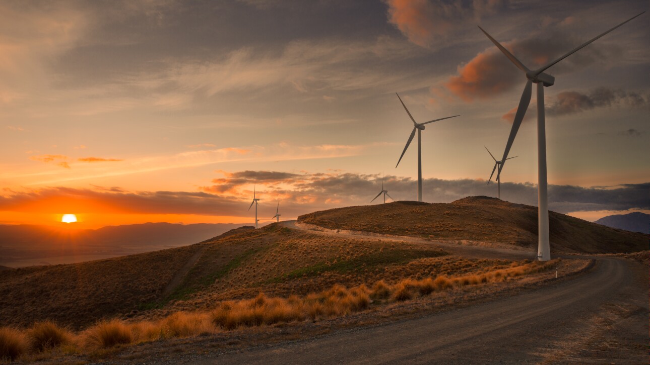Wind turbines on a wind farm in New Zealand during sunset