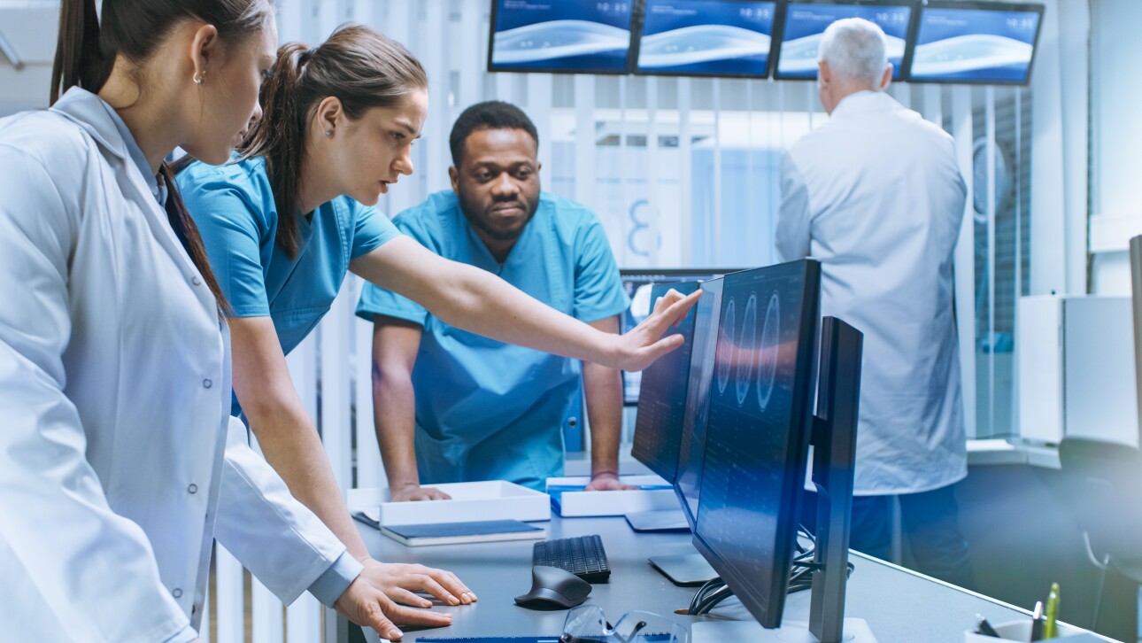 group of doctors looking at images