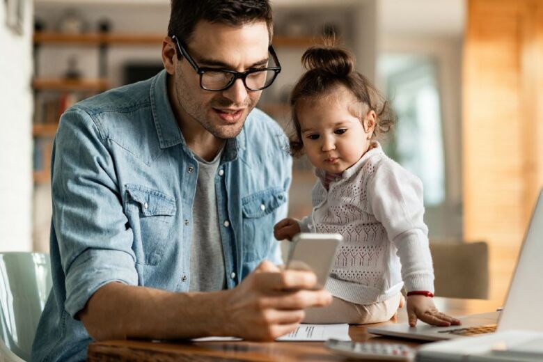 Father - Toddler at table with laptop