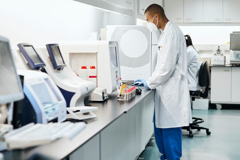 healthcare workers working in lab