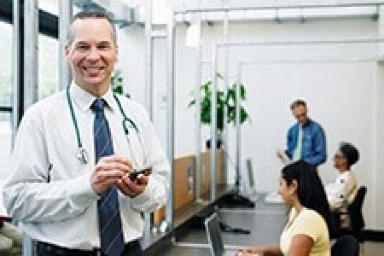 smiling doctor in an office