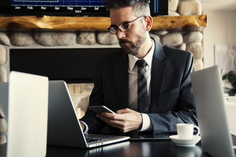 Coffee house man on laptop