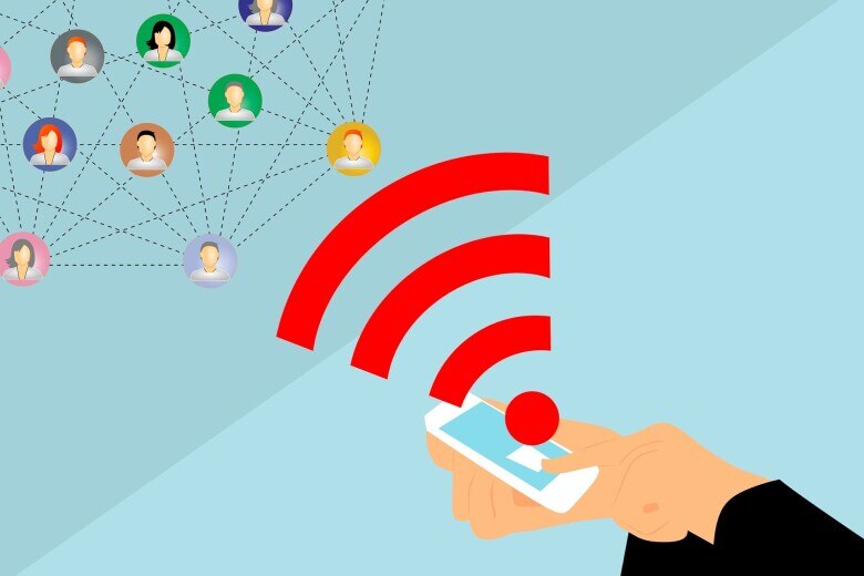 illustration of person sending a message from a mobile phone to a large network of people