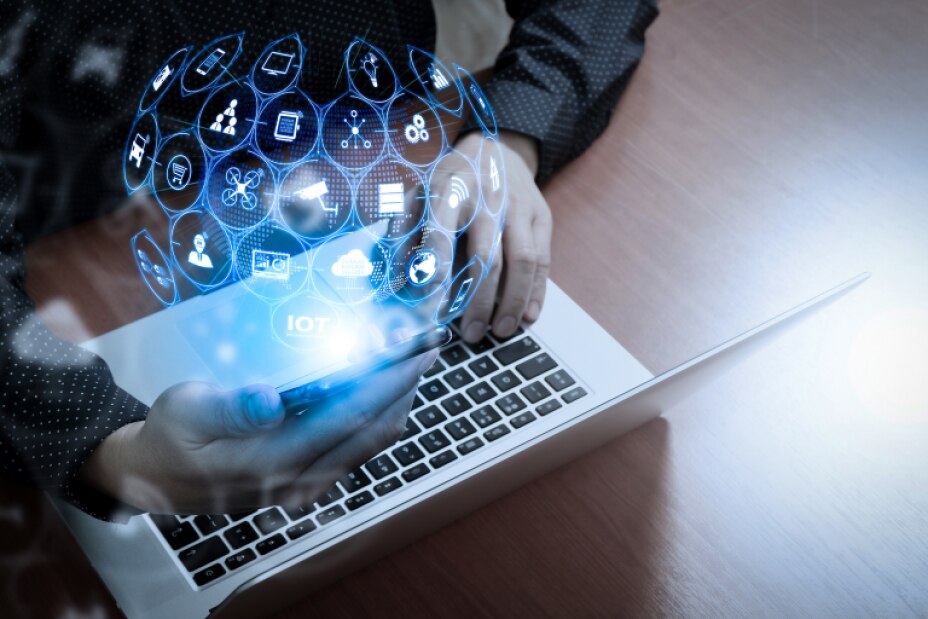 financial services professional looks at mobile phone as high-tech network hologram projects from the phone