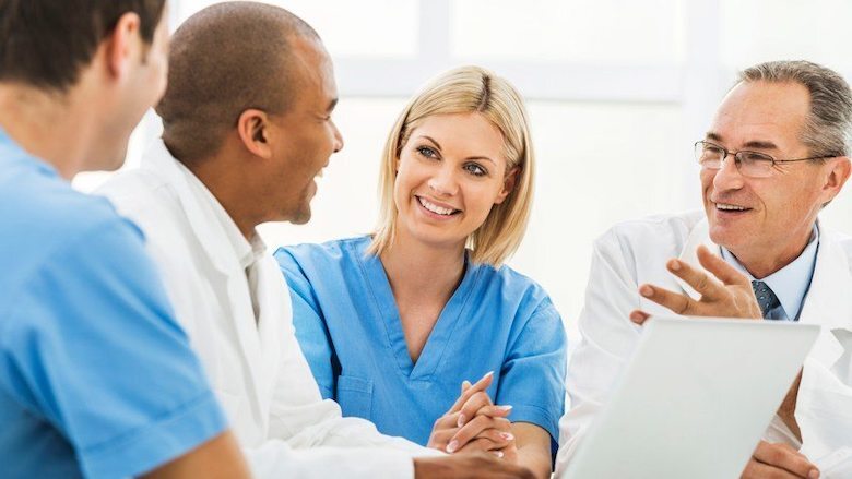 smiling medical staff in a meeting