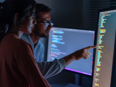 Female IT specialist, male coder talking to connect internet, information update and cloud computing