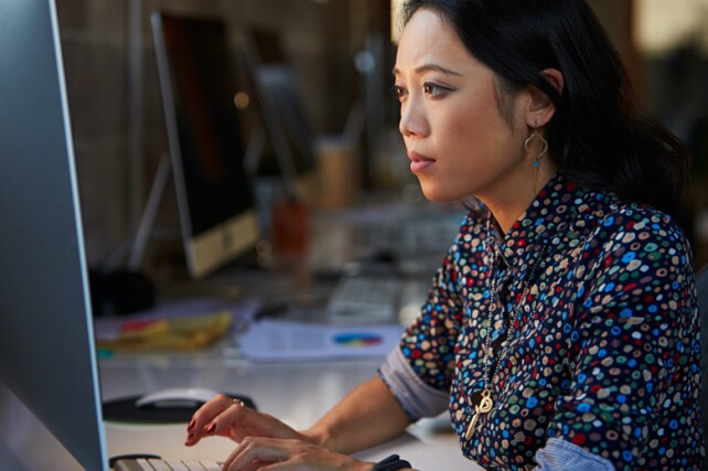 computer programmer working on her computer