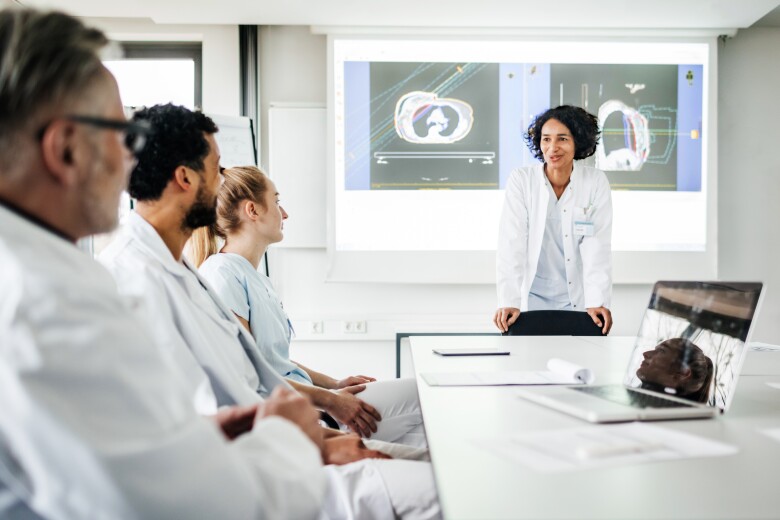 Doctors at conference table