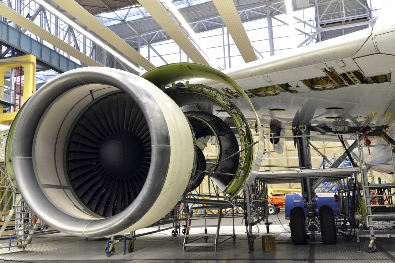Jet engine of an unfinished airplane in a hangar