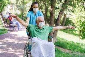 Nurse and patient in wheelchair