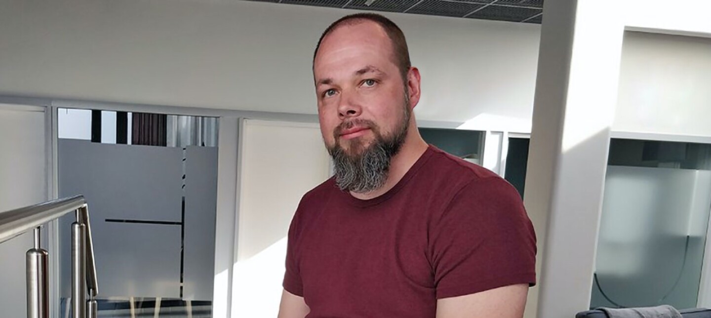 a man in a red shirt