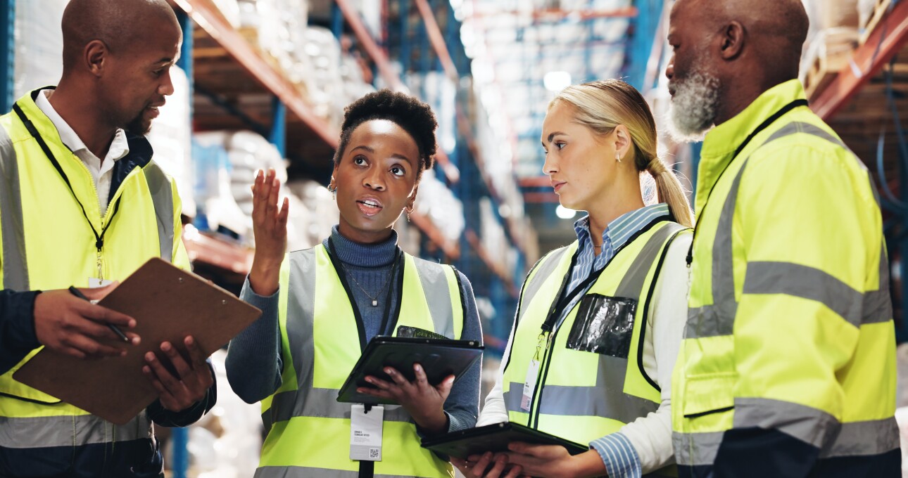 4 people in a warehouse