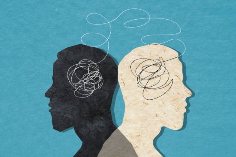 Two connected silhouettes of the same man looking in different directions