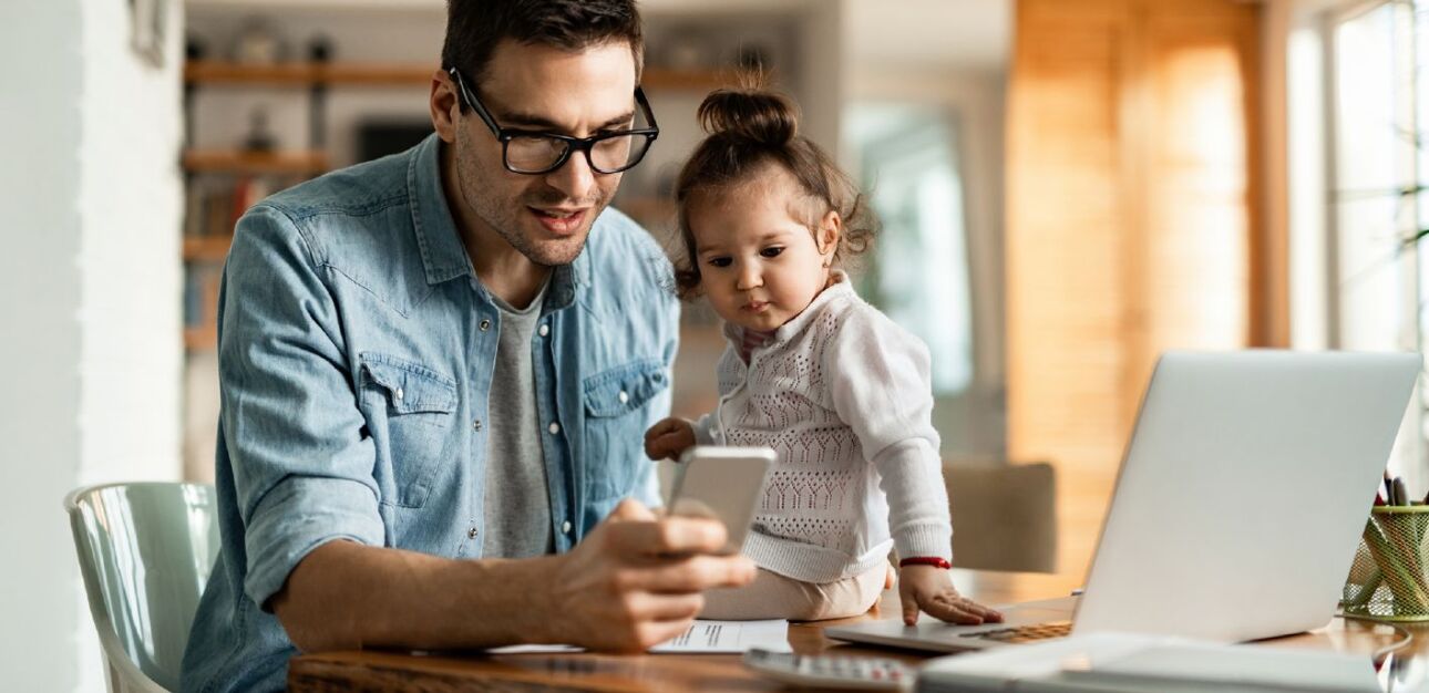 Father - Toddler at table with laptop