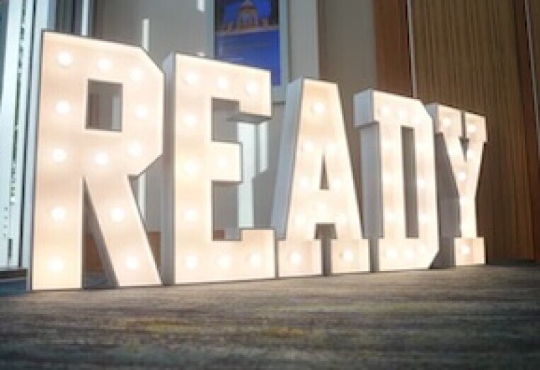 READY spelled out in letters on floor